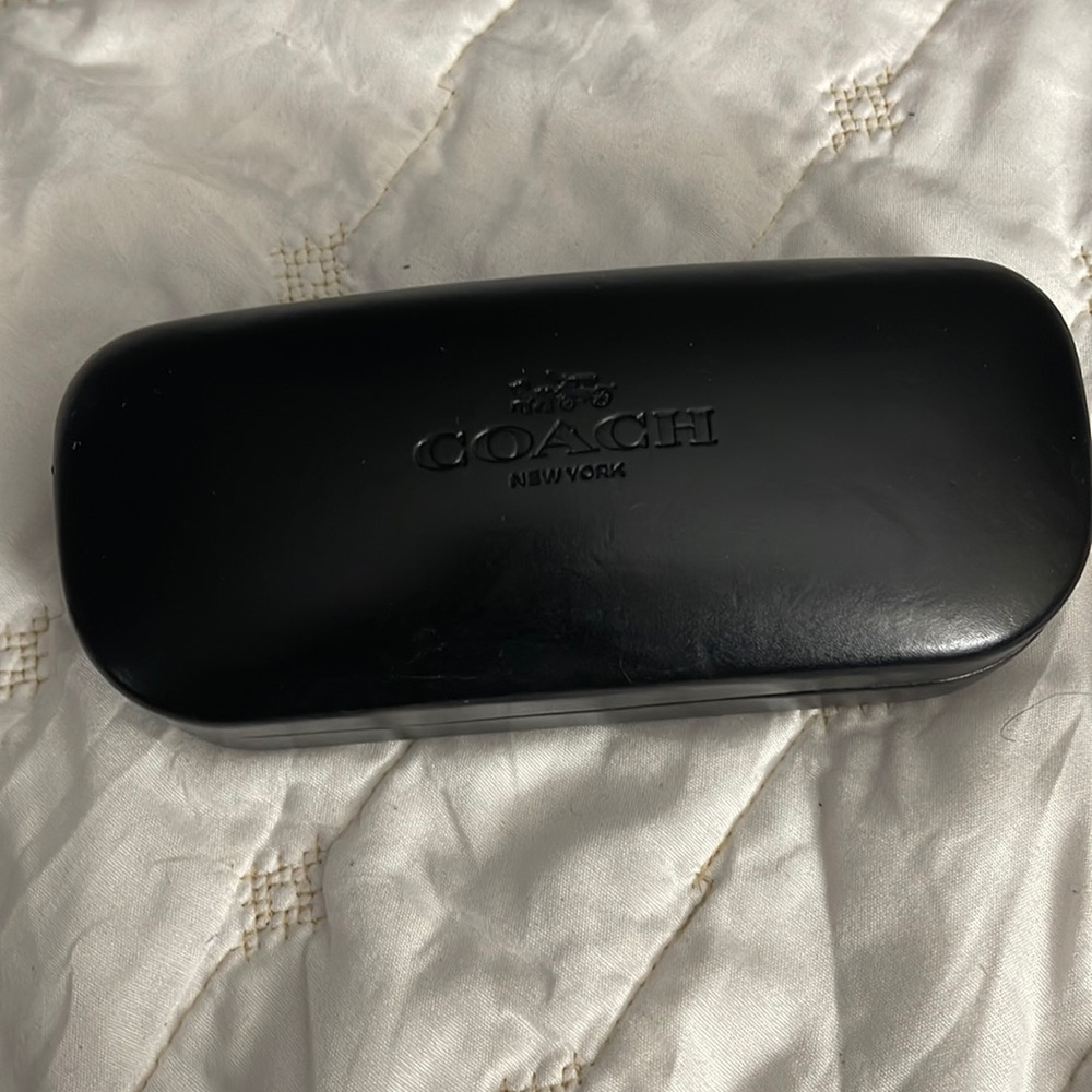 Coach eyeglass case. Good condition. A little wear.